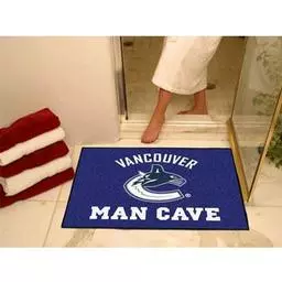 Click here to learn more about the Vancouver Canucks Man Cave All-Star Mat 33.75"x42.5".