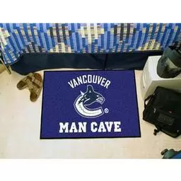 Click here to learn more about the Vancouver Canucks Man Cave Starter Rug 19"x30".